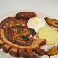 Bandeja Paisa Con Carne Asada · Colombian  country dish 
5 oz of grilled steak served with rice, beans, Colombian fried pork...