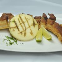 Chicharron Con Arepa · Fried pork belly strip with mini arepa