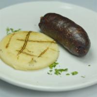Morcilla Con Arepa · Colombian blood sausage with mini arepa