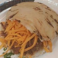 Le Pelua · Shredded beef and Cheddar cheese