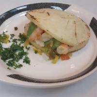Arepa De Camaron · Sauteed shrimp in tomato and onion sauce with avocado