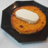 Arepa De Choclo · Sweet yellow corn cake with house made cheese
