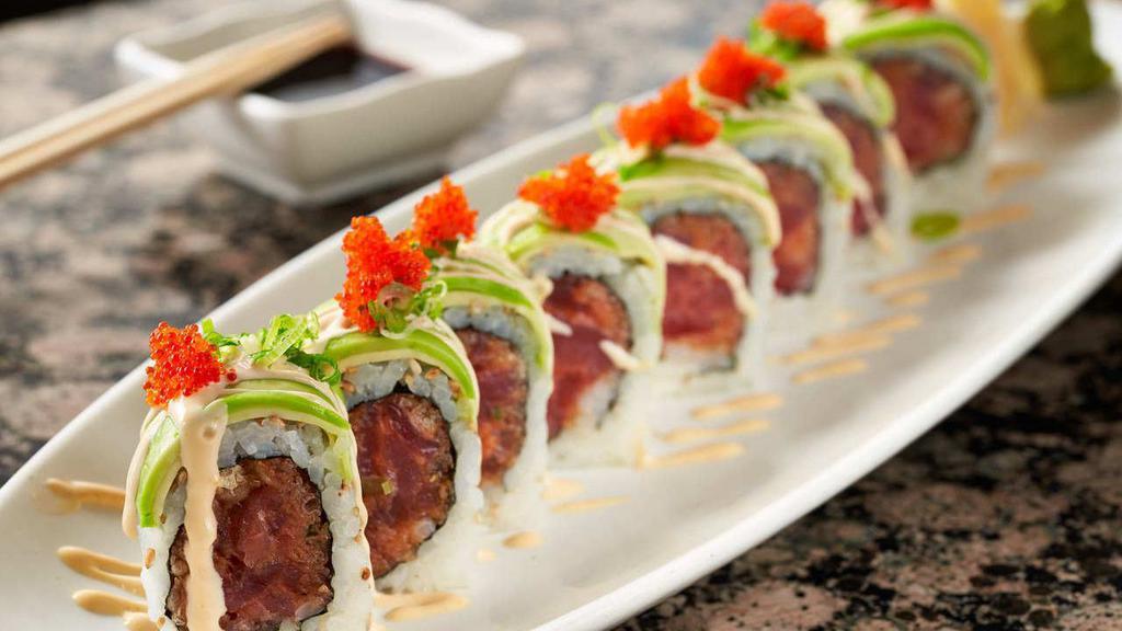 Mexican Roll · Spicy tuna, avocado wrapped, with tabasco sauce, scallion and masago on top.