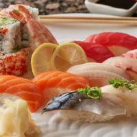 Sushi Deluxe (16 Pieces) · Chef's choice of 10 pieces sushi plus California roll.