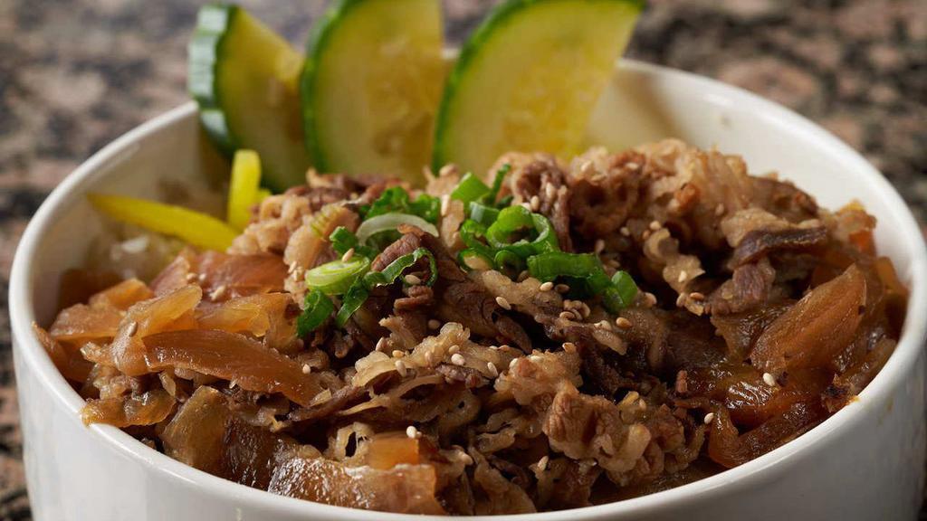Beef Don · Beef oriental sautéed with onion and rice.