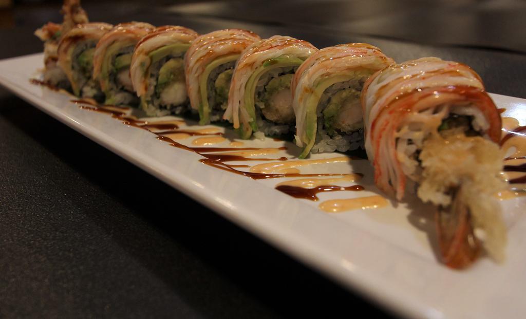 Out Of Control · shrimp tempura, avocado inside topped with avocado, kani with spicy mayo and eel sauce