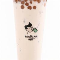 Osmanthus Milk Oolong Tea · Osmanthus Oolong tea mixed with milk and topped with tapioca pearls. Osmanthus Oolong is a f...