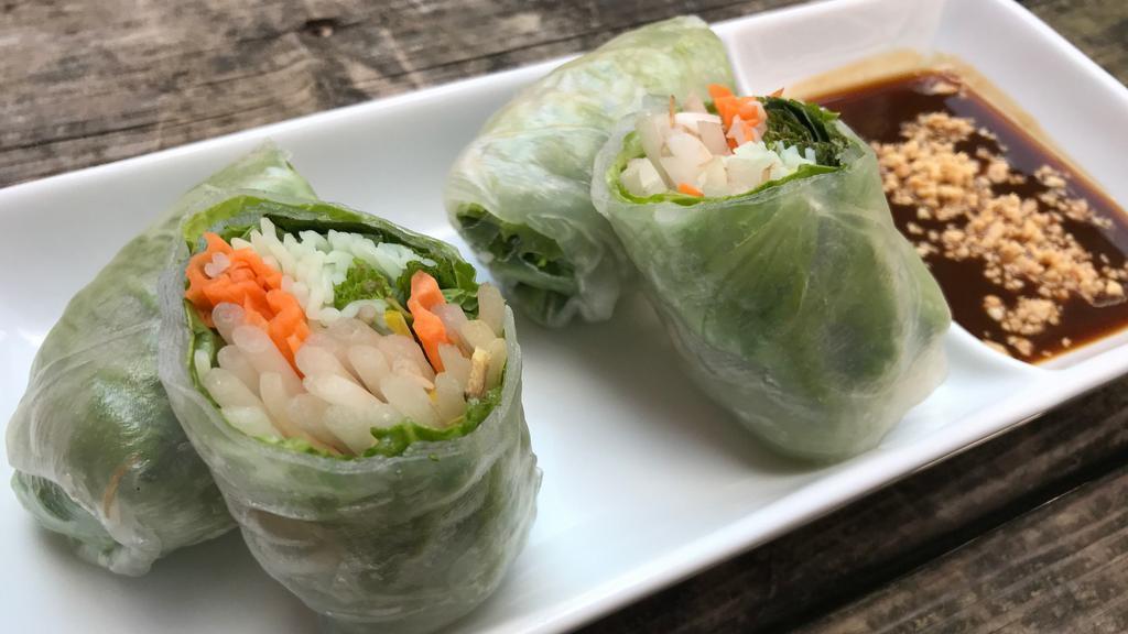 Garden Roll (Summer Roll) · Cucumber, bean sprout, lettuce, mint, and rice noodle wrapped in rice paper and served with chefs special sauce.