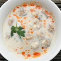 Tom Kha Chicken · Coconut soup with chicken, mushrooms and a touch of galangal.
