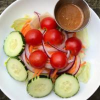 Green Salad · mixed green, cucumber, onion, tomato with peanut dressing