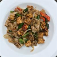 Kee Mow Noodle Tofu · wide rice noodle, onion, tomato, basil, chili, garlic sauce