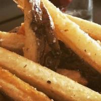 Truffle Fries · Hand cut, salt, pepper, parmigiano, truffle oil