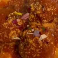 Rigatoni And Meatballs · Homemade meatballs, tomato sauce, parmigiana.