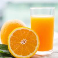 Jugo - Naranja / Orange · Naranjas naturales con el agua y el azúcar.