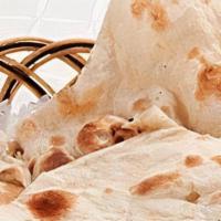 Naan (V/Nf)	 · Vegetarian, nuts free. All-purpose flour bread made in tandoor oven.