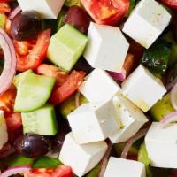 Greek Salad · Lettuce, bell pepper, onions, tomatoes, cucumbers, oil, apple cider, feta cheese, and olives.