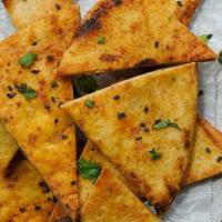 Pita Chips (Sumak) · Baked pita, spices, and oil. Round unleavened flatbread.