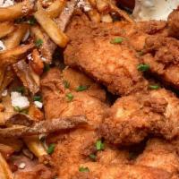Boneless Tenders (Takeout) · slow brined, crispy tenders, tossed in your preference of our house-made sticky sauce, buffa...
