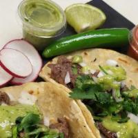 Order Mexican Tacos · Served with corn tortilla, protein of your choice, cilantro, onion, and radish.