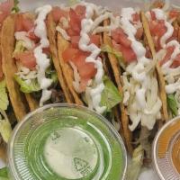 Order Hard Tacos · Served with a crunchy tortilla filled with the protein of your choice, lettuce, tomato, crem...
