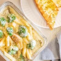 Chicken, Ziti, & Broccoli Alfredo Sauce Pasta · Served with garlic bread.