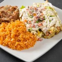 Enchilada · Three corn tortillas, choice of one filling, salsa verde, topped with melted cheese. Side of...