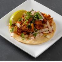 Taco · One fresh handmade corn tortilla with choice of one filling, onions cilantro, radish.