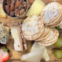Murray'S Nyc Cheese Board · Assortment of five cheeses, seasonal fruit preserves, house mustard, crackers and accoutreme...