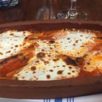 Gnocchi Sorrentina · Handcraft with potatoes, tomato sauce, basil, fresh mozzarella.