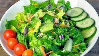 Salad · Organic salad with onion, tomatoes, cucumber topped with cilantro, Himalayan salt, and black...