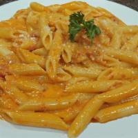Penne Alla Vodka Family Dinner Meals · Made with Prosciutto and Onions Sauteed in Vodka Cream sauce and Parmigiano Cheese.
Serves A...