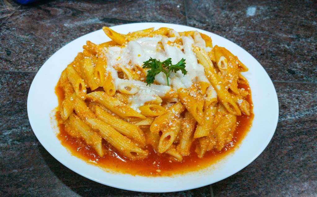 Baked Ziti · A Delightful Blend of Ricotta, Parmigiano, and Mozzarella Cheese Baked to Perfection with Penne Pasta.