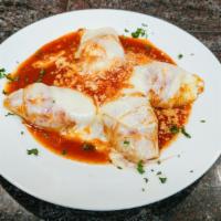 Stuffed Shell · Pasta Shell Stuffed with Ricotta, Mozzarella and Parmigiano Cheese.  Topped with Our Homemad...