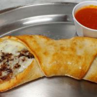 Steak Pizza Roll · Steak Pizza Roll, have philly steak and mozzarella rolled up in pizza dough. Dip them in war...