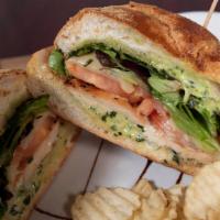 Caprese Chicken · Grilled chicken breast, fresh mozzarella, and spinach mixed greens with roasted garlic aioli...