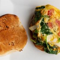 Lilly'S Sandwich · Peppers, onion, tomato, spinach all scrambled with egg topped with provolone cheese and serv...