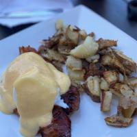 Irish Benedict · Toasted English muffin topped with our homemade corn beef hash, two poached eggs, and our ho...