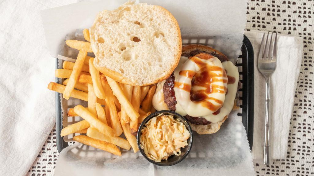 Rodeo Burger · Onion rings, BBQ and American cheese.