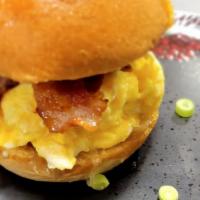 Bacon Egg And Cheese · Hardwood smoked bacon, cage free over medium eggs, Tillamook Cheddar Cheese and Chipotle Ket...