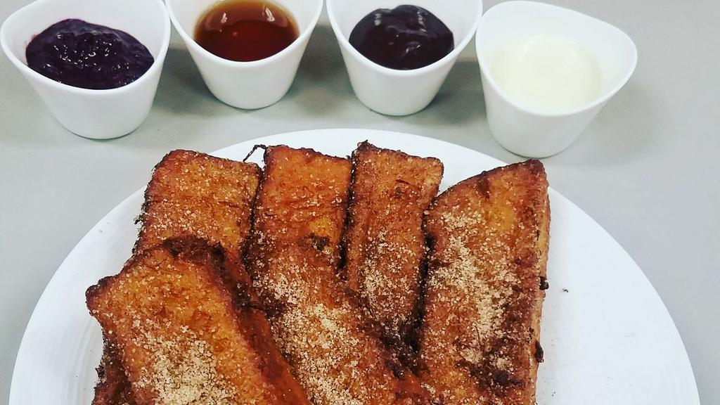 Cinnamon Sticks Entree · Brioche French toast covered in cinnamon
and sugar, served with Creme Anglaise.