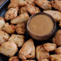 Mike’S Famous Grilled Chicken Bites · All white meat chicken, grilled, & served with choice of dipping sauce.