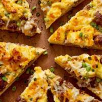 The Breakfast Pizza · The anytime breakfast pizza with Egg & Cheese with your choice of crust & toppings.