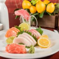 Sashimi Dinner · Sixteen pieces of top selections.