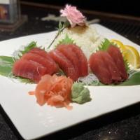 Tekka Don · Sliced tuna on a bed of seasoned rice.