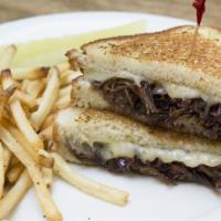 Brisket Grilled Cheese Sandwich · Guinness braised with grilled onions and pepper jack cheese on sourdough. Served with choice...