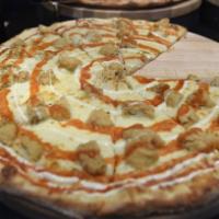 Buffalo Chicken Pizza · Hand tossed, bechamel, mozzarella, Parmesan, blue cheese dressing, Miguel's hot sauce and bo...