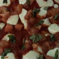 Margherita · Fresh mozzarella, fresh basil and fresh tomato.