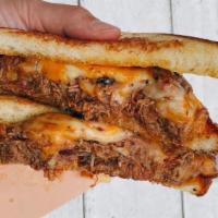Fedpig Melt · Smoked Pulled Pork, melted cheddar and jack, bbq sauce, texas toast - comes with fries