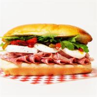 The Godfather Sub · Prosciutto, capicola, salami, mozzarella, spring mix, and roasted red peppers on a hoagie ro...