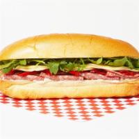 The Salami Sub · Italian salami, provolone cheese, Iceberg lettuce, and roasted red peppers on a hoagie roll.